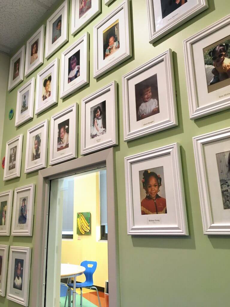 A photo of the staff photo wall at Safe Shores