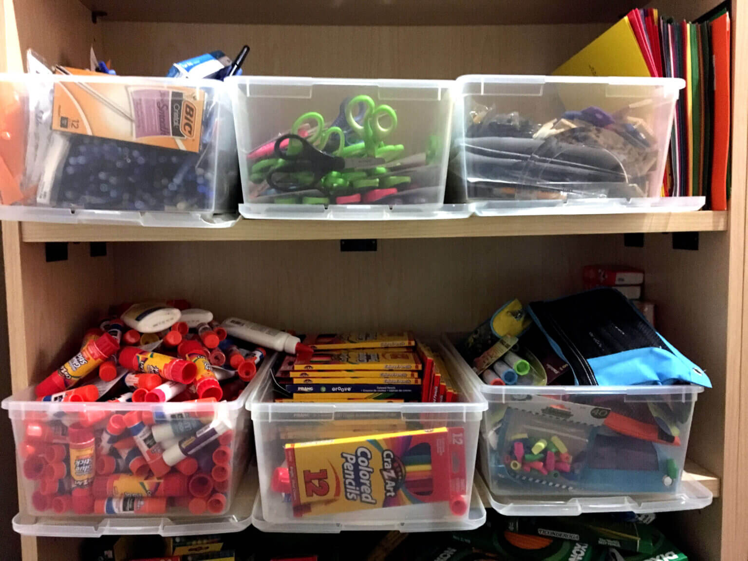 A photo of bins of school supplies at Safe Shores